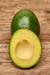 avocado on a old wood background. tinting. selective focus