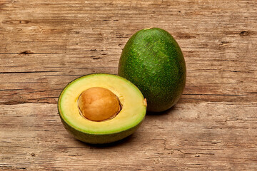 avocado on a old wood background. tinting. selective focus