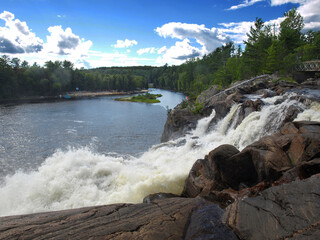 Rushing water down into the lake, Muskoka, ON, Canada
