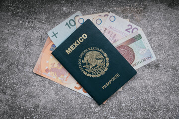 Mexican passports with banknotes from different countries