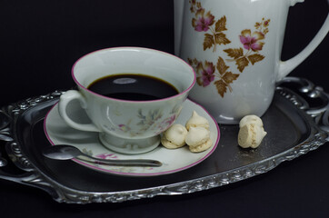 cup of coffee and cookies