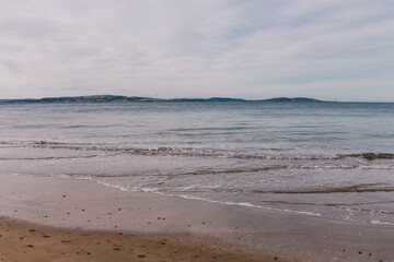 beautiful pristine Tasmania beach with serene sky on a winter evening at dusk