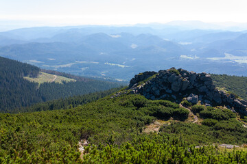 Naklejka na ściany i meble View of the chain of mountains from Kráľova hoľa [mount], Slovakia. August 8 2016.