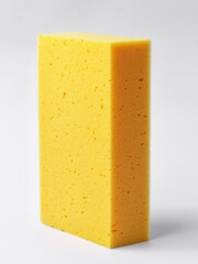 Yellow sponge on white background