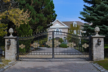 mansion with gilded gate