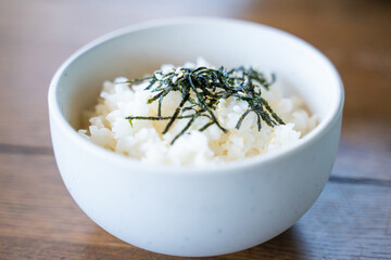 cooked japanese rice with seaweed and sesame
