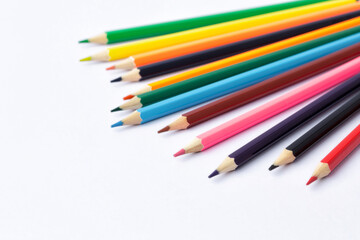 Color pencils on white background.Close up.