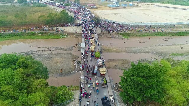 Dominican republic and Haiti border, Aerial view of traffic and a queue of people on the Dajabon bridge