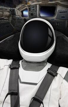 American astronaut on a spaceship flying through the outer space on a space mission. Elements of this image furnished by NASA.