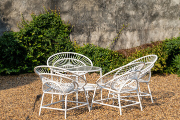 White steel table and chair set For relaxing in the outdoor garden
