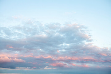 Obraz premium Bright pink sunset sky Background and the texture of the clouds
