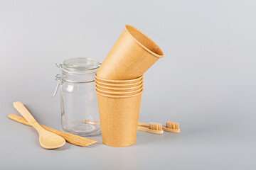 eco natural paper cups on gray background. sustainable lifestyle concept. zero waste, plastic free items. stop plastic pollution. Copy space, template, Mockup. High quality photo