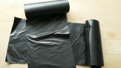 a roll of plastic bags for garbage collection