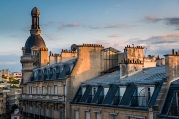 Morning view of the Parisian apartment rooftops with soft lighting