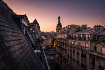Sunset Golden hour view of Parisian apartment building on a quiet day, France