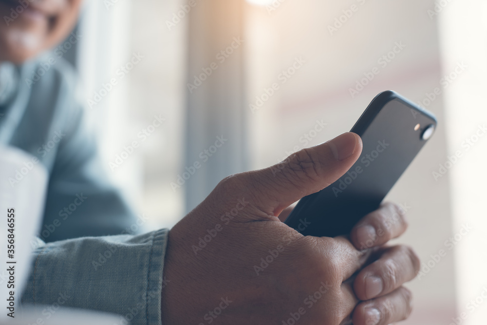 Sticker close up of casual man using mobile phone