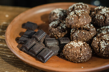 Brown cookies and chocolate on the plate
