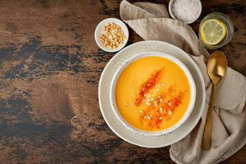 Autumn pumpkin soup with smoked paprika, pine nuts, vegetarian dish