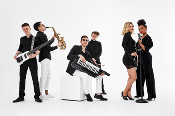 International group of musicians on a white background, guitarist, drummer, soloists, saxophonist....