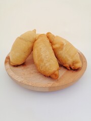 Molen pisang (pisang molen), Indonesian traditional food (street food) from Yogyakarta (East Java). Fried banana wrap indonesian traditional food. The taste is sweet, crunchy outside and soft inside.