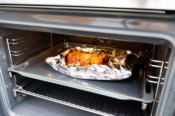 Roasted juicy meat in the oven