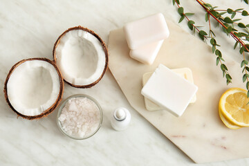 Natural cosmetics with ingredients on table