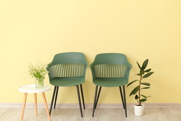 Interior of modern living room with chairs and table