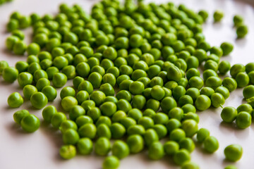 Green fresh peas isolated on white top view.