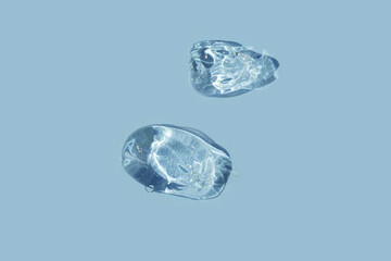 swathes of trasparent gel on blue background