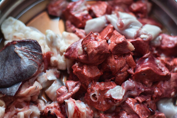 sliced of mutton in a plate with shallow depth of field, Indian Mutton 