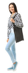 Obraz premium Young woman with eco bag on white background
