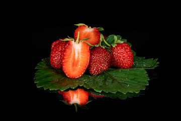 strawberries on a black background