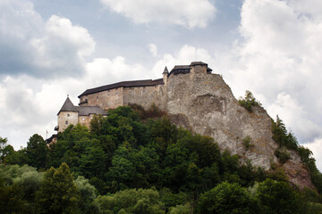 Fototapeta na wymiar Orava Castle on a high rock above Orava river in the village of Oravsky Podzamok in Slovakia