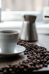 cup of coffee on the background of the window