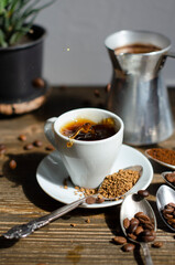 coffee splashes out of the cup