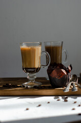 chocolate muffins on the table with a cup of coffee