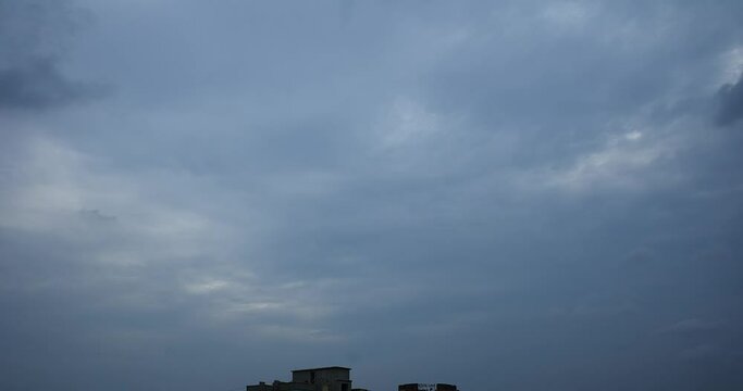 firest rain dark clouds timelapse moving with rays