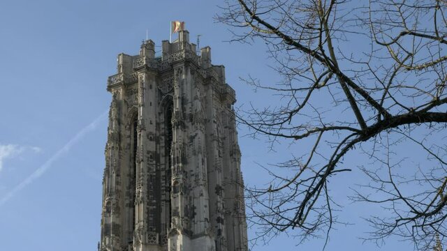 Low angle view to the top of St. Rumbold's Cathedral tower in Mechelen