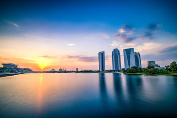 Peaceful and quiet sunset view of the Putrajaya office buildings by the lake