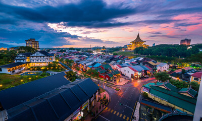 Wide shot of Kuching city skyline during blue hour evening, Sarawak