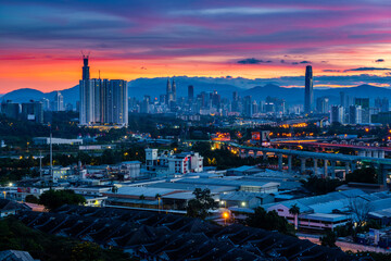 Early morning sunrise view of Kuala Lumpur city skyline, Malaysia capital