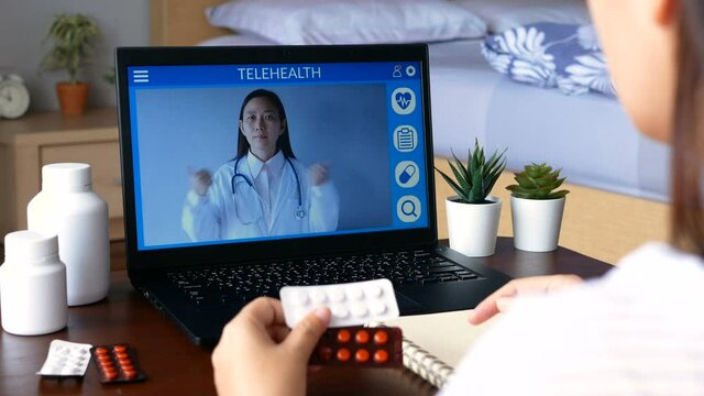 deaf mute patient use remote distance video conference, make online consultation by sign language with doctor on laptop about illness, medicine via vdo call. Telehealth, Telemedicine, online hospital