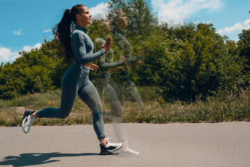 Running girl in city park. Young woman runner outdoor jogging. In-camera multiple exposure image.
