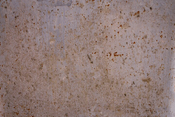 Rough Rusty painted metal surface on wall background with grey color, front or top view