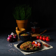 Buckwheat groats baked in the oven with beef goulash