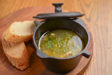 Traditional Ukrainian soup with meat and vegetables. Ukrainian cuisine, healthy green soup