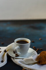 cup of coffee with chocolate croissants on the table