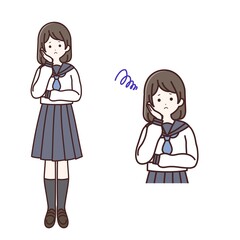 悩んでいる長袖制服の女子生徒