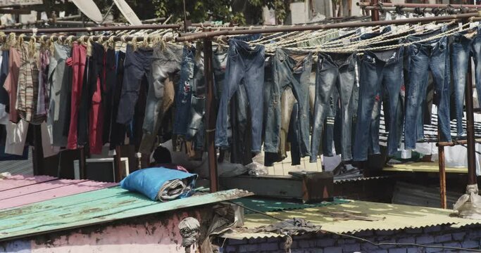 shot of clothes on the clothesline in the laundry.