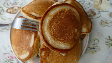 small pancakes on a plate for Breakfast